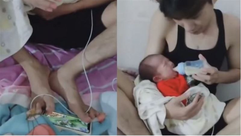 新手爸哄嬰時「用腳打手遊」老婆傻眼