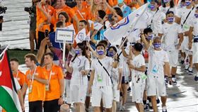 ▲世運會閉幕典禮，由合球隊隊長吳俊賢任掌旗官率代表團進場。（圖／體育署提供）