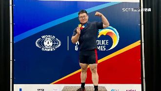 獨／世警運奪金　台中消防披國旗領獎