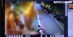 邱男等8人和鄰居王男疑在自家大門口狹路相逢，邱男怒瞪一眼，上前談判希望日前官司糾紛能和解撤告。圖／翻攝畫面