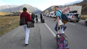 普丁，動員令，徵召，喬治亞邊境大排長龍  (圖／美聯社／達志影像)