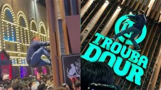 梨泰院驚見「蜘蛛人」！爬牆掛招牌上求生