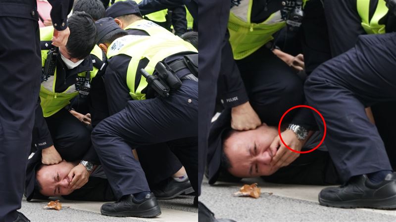 諷刺！陸警4人壓1人　手戴勞力士摀民嘴　