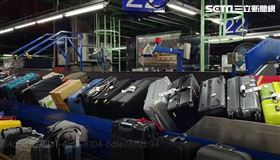 ▲長榮航勤董事長陳有玉、總經理林大淵和多位主管 衝第一線搬行李 畫面 轉盤 盤櫃 停機坪 （圖／記者張昱傑攝影） 