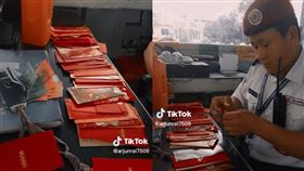 大馬警衛新年發財！狂收紅包擺滿桌「錢數到手軟」　全場嗨翻：想跳槽