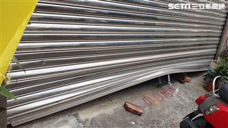 苗栗市一家彩券行遭竊，鐵門遭用千斤頂撬開。（圖／翻攝畫面）