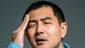 頭暈、頭痛。（示意圖／pexel）