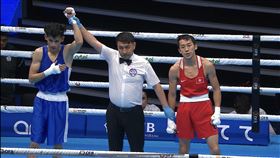 ▲林郁婷的陪練員李承威首度當選男子世錦賽國手，以積分5：0完勝香港職業拳王曹星如。（圖／中央社）