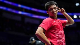 ▲李洋受傷後忍痛奮戰，但第2局3：11時依舊退賽。（資料圖／翻攝自李洋臉書）