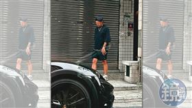 本刊讀者回報，5月24日中午12點多，余文樂現身北市萬華一家麵館，用完餐的他低頭走向黑色保時捷。（讀者提供）