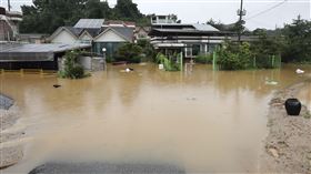 暴雨強襲韓國！釀洪災山崩　至少22死14失蹤、數千人被迫疏散。（圖／美聯社／達志影像）
