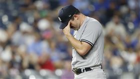 ▲洋基先發投手羅登（Carlos Rodon）本季最後一次先發沒解決任何出局數丟8分。（圖／美聯社／達志影像）