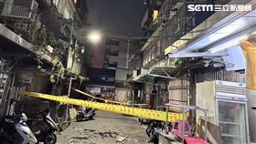 台北市萬華區梧州街巷內民宅發生磁磚掉落意外。（圖／翻攝畫面）