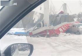 陸逢15年來罕見暴雪　壓垮超市收銀員活埋（圖／微博）