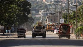 ▲海地太子港發生暴力衝突，導致通訊受損，並導致越獄事件發生。（圖／路透社／達志影像）

