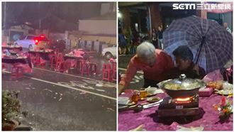 風雨吹掀桌椅　淡定嬤撐傘吃「真流水席」