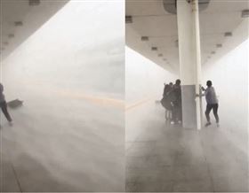 狂風挾暴雨如末日　月台乘客抱柱險被捲走