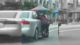  彰化員林，阻止兒子女友投案，男當街鑽進副駕駛座，抓車門，腳騰空，甩飛(圖／翻攝自社會事新聞影音)