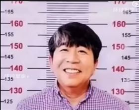 擁1500間套房房東槍殺房客　被捕後笑出來（圖／翻攝微博）