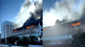 火災當時，火舌濃煙不斷竄出，四樓起火點被員工指出，堆放大量紙箱跟化學藥劑。（圖／翻攝畫面）