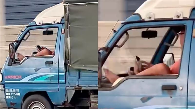 扯！貨車男「腳跨車窗、滑手機」飆國道