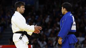 日本名將永山龍樹8強賽意外不敵西班牙好手葛瑞戈斯（Francisco Garrigos），因為不滿裁判判決，拒絕和對手握手。（圖／歐新社／達志影像）