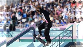 堀米雄斗3次大招都未能成功施展，一度落到第7名，不過他把握最後一次機會，取得97.08的高分，以0.1分逆轉摘金、成功衛冕。（圖／美聯社／達志影像）