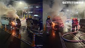 白色轎車起火，消防人員趕緊佈水線灌救。