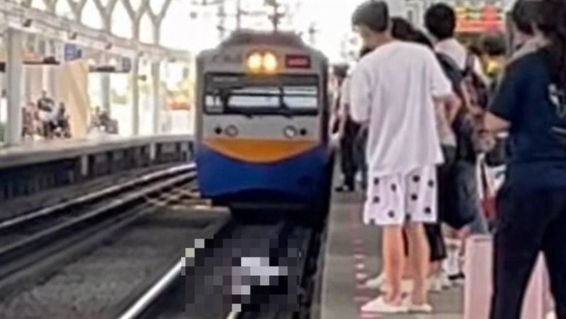 悚！他趴台中火車站鐵軌　列車急停煞