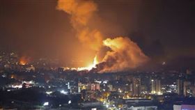 28日以色列空襲黎巴嫩首都貝魯特。（圖/路透社/達志影像）