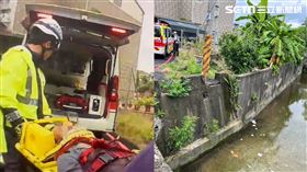 高雄一名60歲男子趁颱風來前修剪住宅旁的樹木，為了撿鏈鋸不慎整個人跌落路旁水圳，當場昏迷緊急送醫。（圖／翻攝畫面）