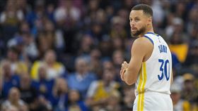 柯瑞兩度扭傷腳踝提前退場。（圖／美聯社／達志影像）