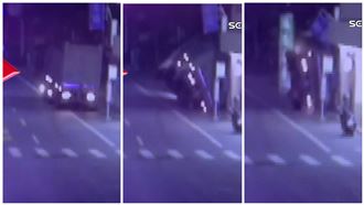 壓垮水溝蓋！車載砂石停路邊突翻覆壓民宅
