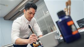 蔣萬安提筆寫春聯（圖／台北市政府提供）