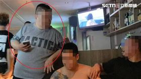 同理會成員「肥肥」（灰衣者）疑為擄人案的幕後主使者。（圖／翻攝畫面）