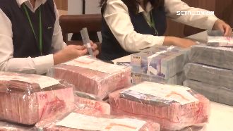 獨／點過年香油錢　千萬銅板、鈔票分類忙