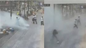 緬甸地震影響大陸雲南地區，瑞麗市一棟建築物的水台爆料，導致街上出現巨浪，將市民淹沒、沖走。（圖／翻攝自網易視頻）