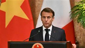 ▲法國總統馬克宏昨晚飛抵越南。（圖／美聯社／達志影像）