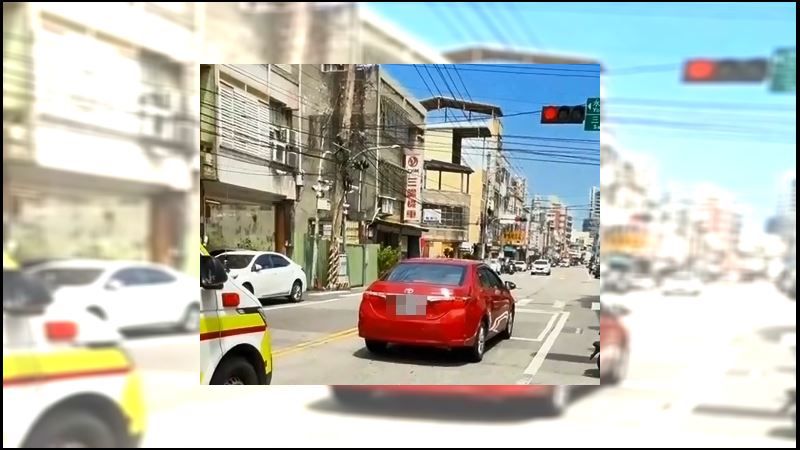紅車駕駛為了停紅燈阻擋救護車,下場被吊銷駕照。(圖/翻攝自社會事新聞影音)