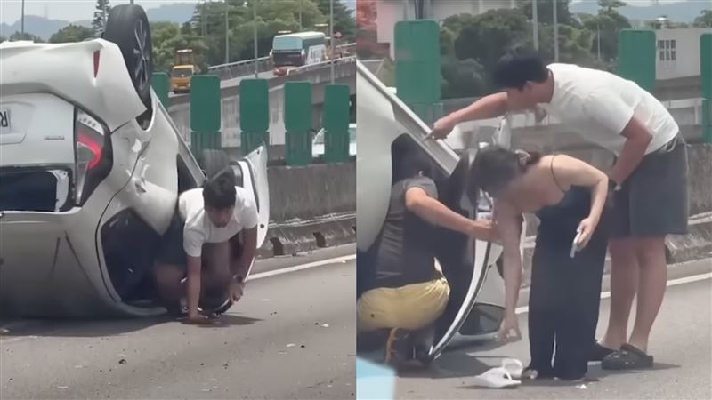 民眾從車上爬出來。(圖/翻攝自YouTube-WoWtchout - 地圖型行車影像分享平台頻道)