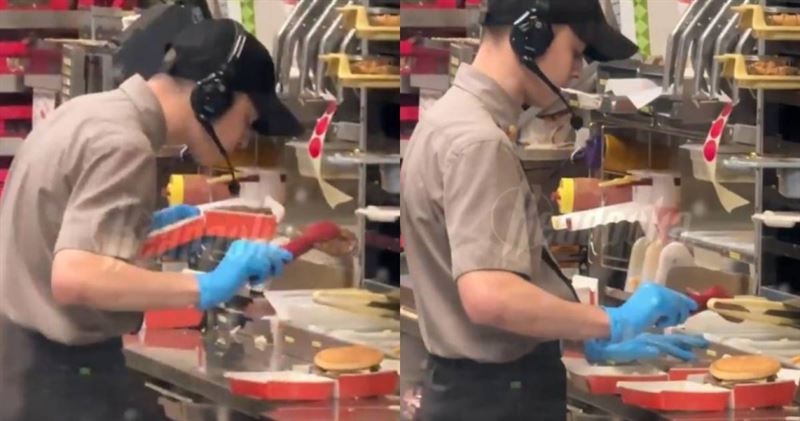 俄國速食店員與客人口角不爽,吐口水在給客人的漢堡裡。(圖/翻攝X)