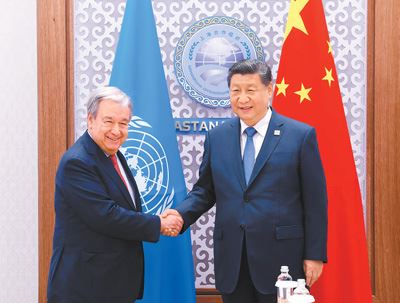 中國不斷安插親中人士在聯合國高層。圖為中國國家主席習近平會見聯合國秘書長古特雷斯。(圖/翻攝自新華社)
