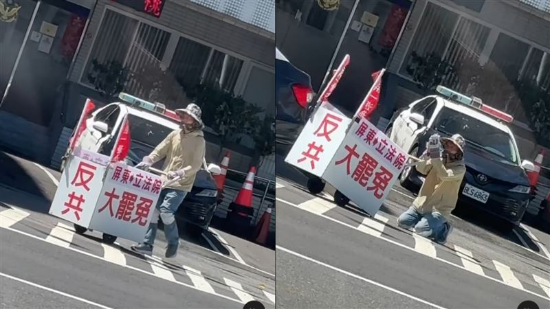 一名男子在路上推著宣傳大罷免的推車,每走幾步就跪拜、叩首。(圖/翻攝自Threads)
