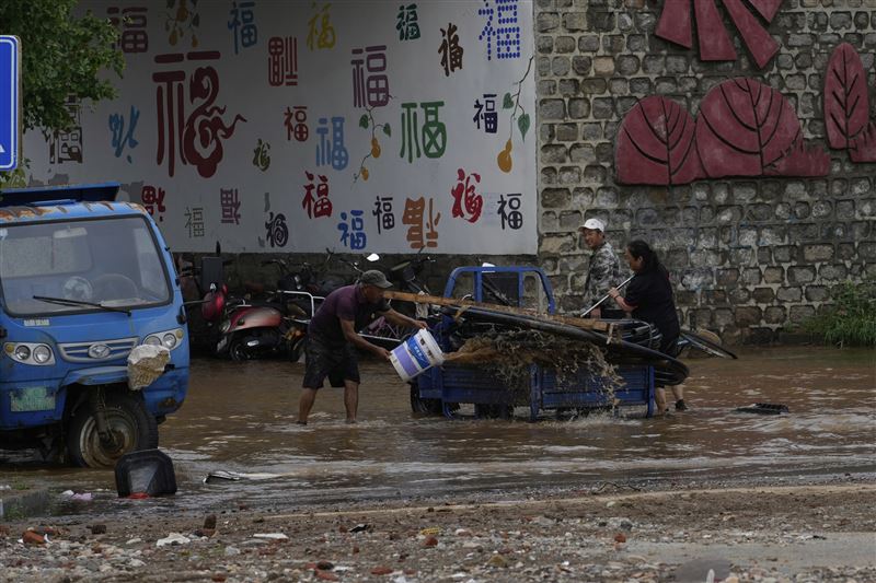 北京郊區密雲區受豪雨影響嚴重。(圖/美聯社/達志影像)