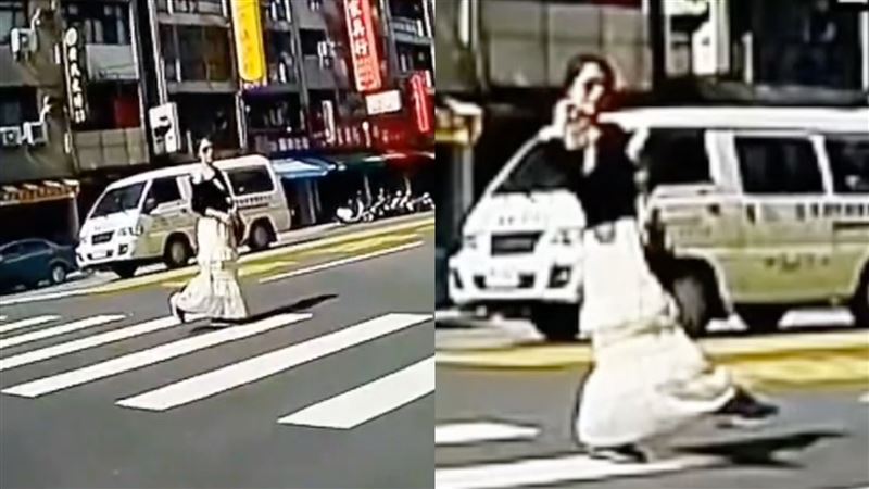 黑衣白裙的女子將斑馬線當作伸展台，蜜腿左右勾。（圖／翻攝自社會事新聞影音畫面）
