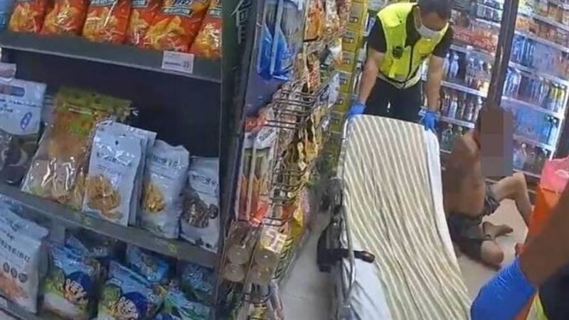男子醉倒超商，被發現竟是洗錢通緝犯。（圖／翻攝畫面）