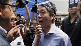 流亡海外逾4年的前香港立法會議員許智峯15日終於獲得澳洲庇護。（圖／美聯社／達志影像）