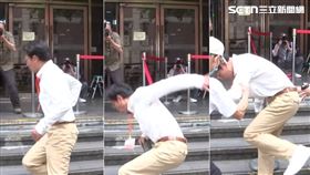  黃國昌在北院門口受訪結束，疑似踩到紅龍底座「鏘」的一聲，差點滑跤跌倒，旁人趕緊幫忙扶，還有最後穩住身子沒有大礙。（圖／翻攝畫面）