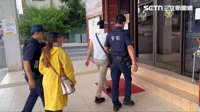情侶相差１９歲當街爆吵，吸引民眾關注，員警將兩人請回派出所調解。（圖／翻攝畫面）