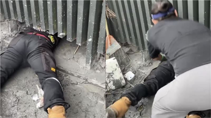水電師傅冒險鑽進圍欄進行搶修。（圖／翻攝自民進黨立委吳沛憶Threads）